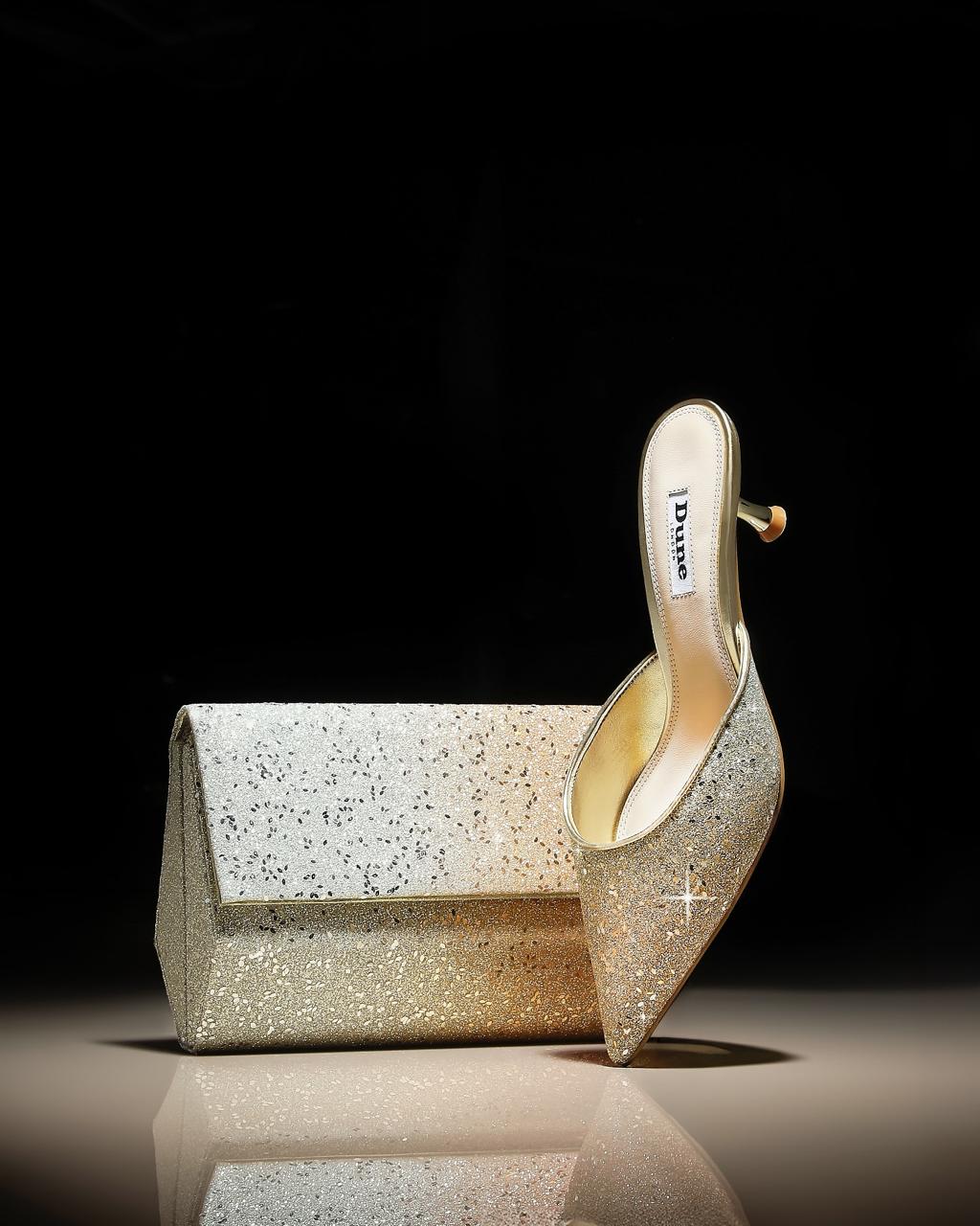 Dune London Ramadan Edit — glitter mule and clutch still life