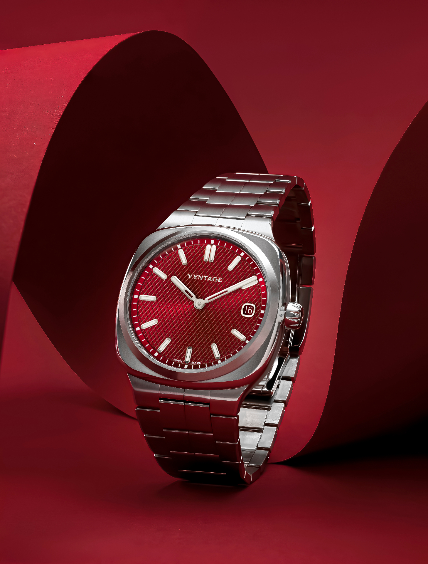 Vyntage Strata red dial timepiece on red backdrop