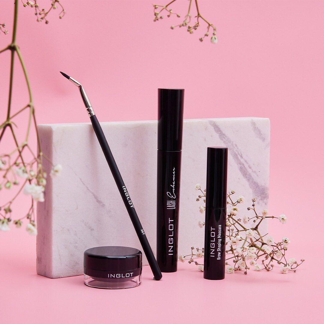 Inglot lash and brow set styled with blossoms